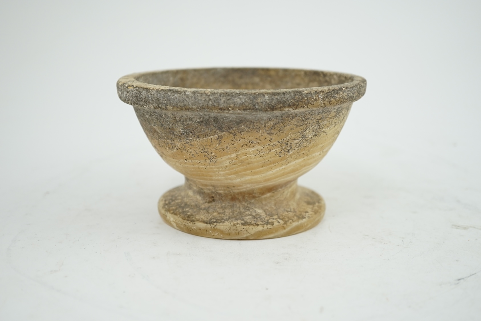 An archaic alabaster footed bowl, possibly Egyptian